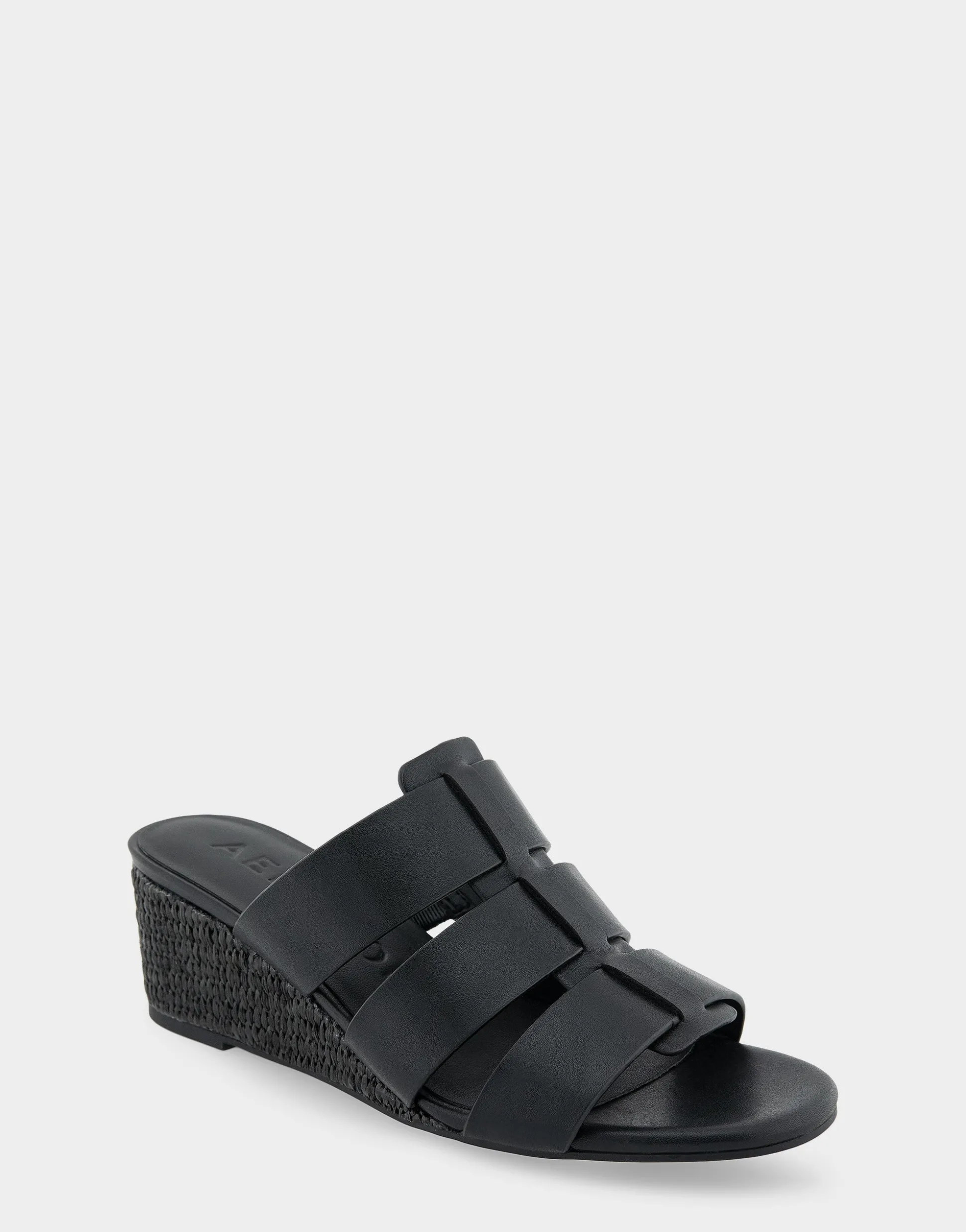 Comfortable Women's Fisherman Mid Wedge Slide in Black Faux Leather