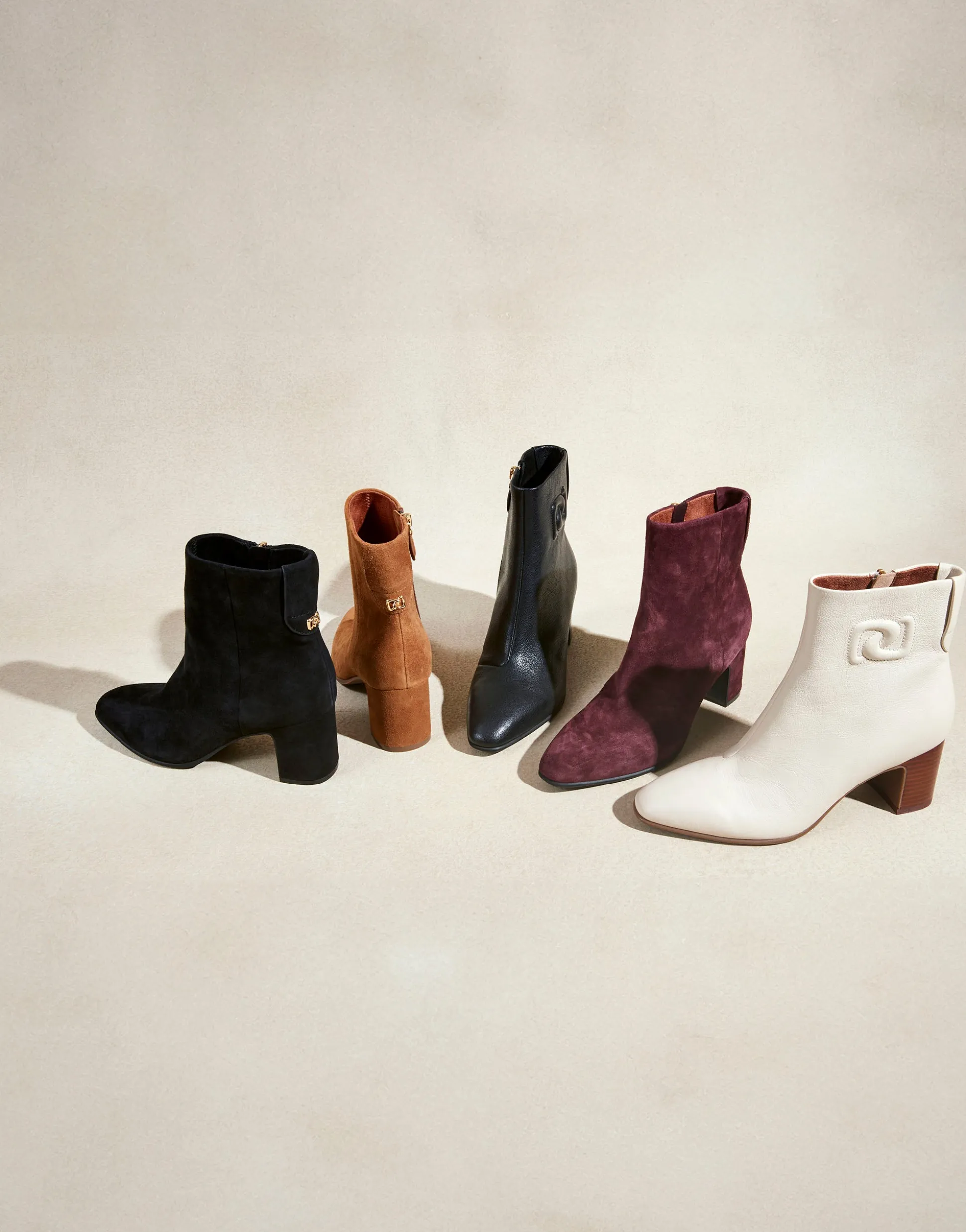Comfortable Women's Tapered Toe Covered Heel Bootie in Eggnog Leather